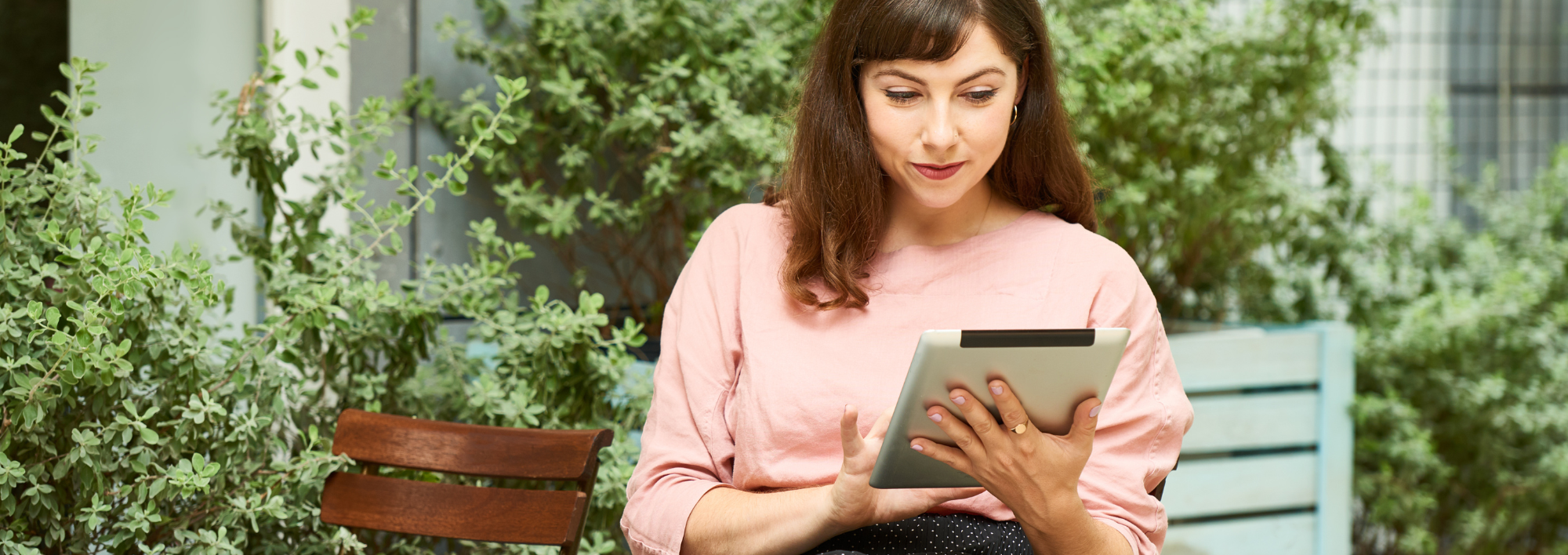 person holding tablets
